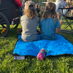 Close-up of the Adventure Mini Mat’s vibrant, textured surface showing detailed stitching and colorful geometric patterns.