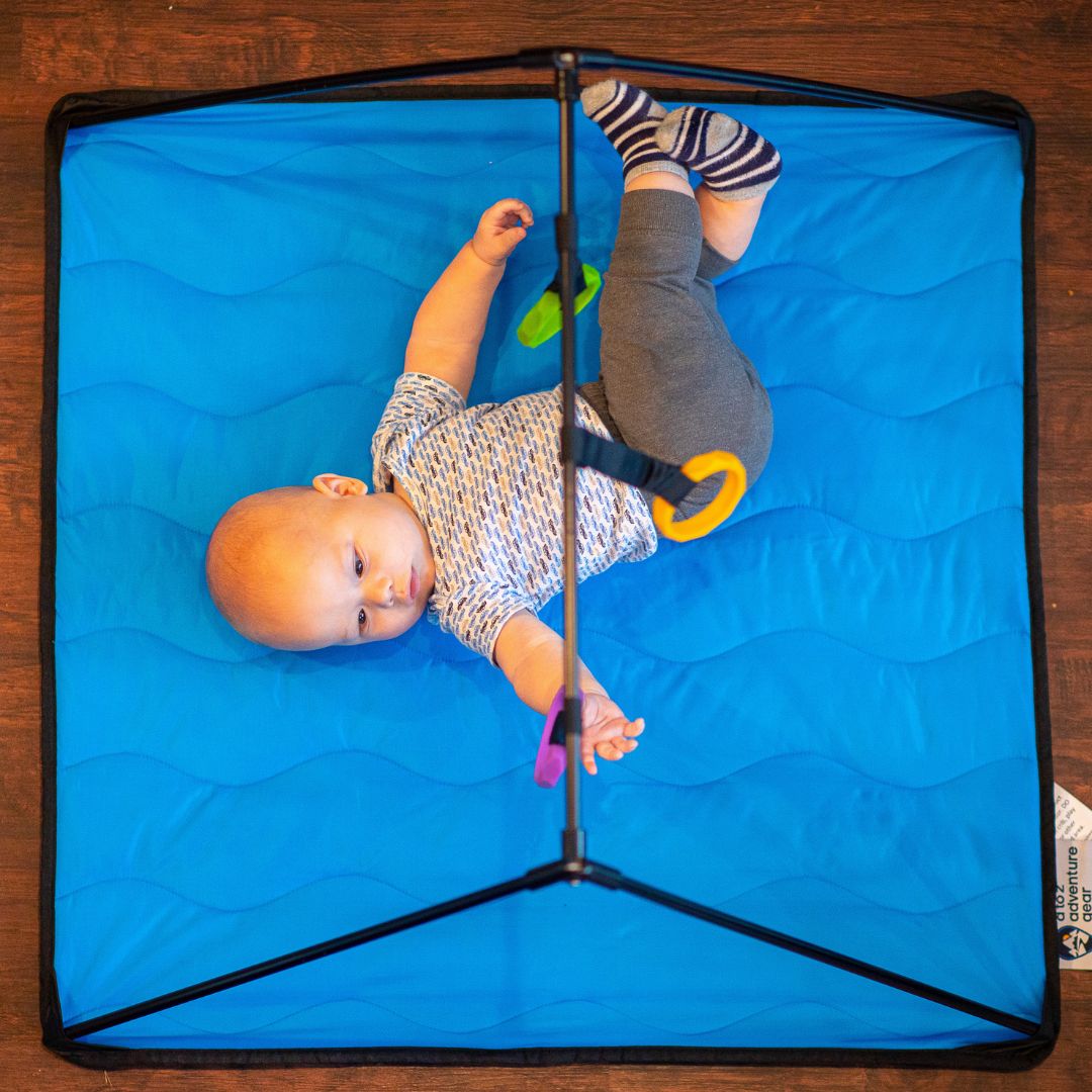 Close-up of the two woven fabric mats with textured surface and visible stitched edges, showing their soft, plush finish and